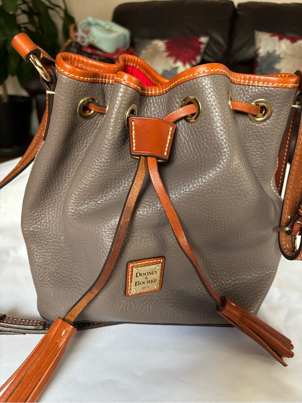 Dooney & Bourke Gray Leather Drawstring Crossbody with Brown Trim
